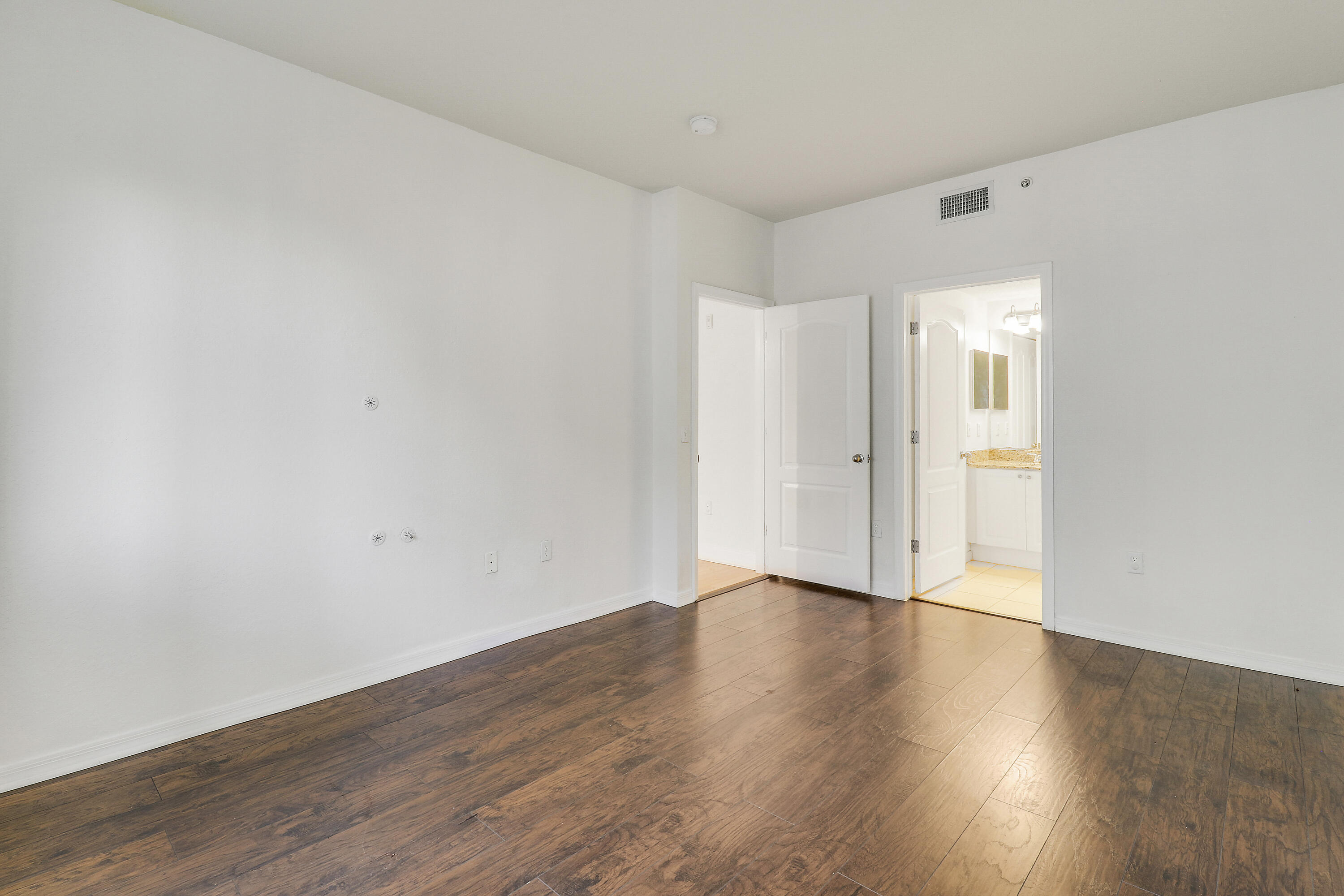 11033 Legacy Boulevard, Unit 203 Palm Beach Gardens, FL 33410 - Photo 26 of 31 Primary Suite