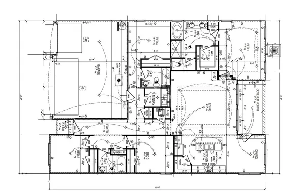 a black and white photo of a living room