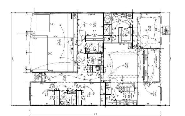 a black and white photo of a living room