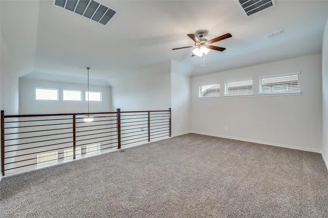 a view of a livingroom with a ceiling fan