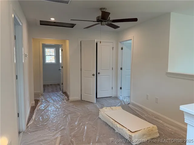a bathroom with a shower and a toilet