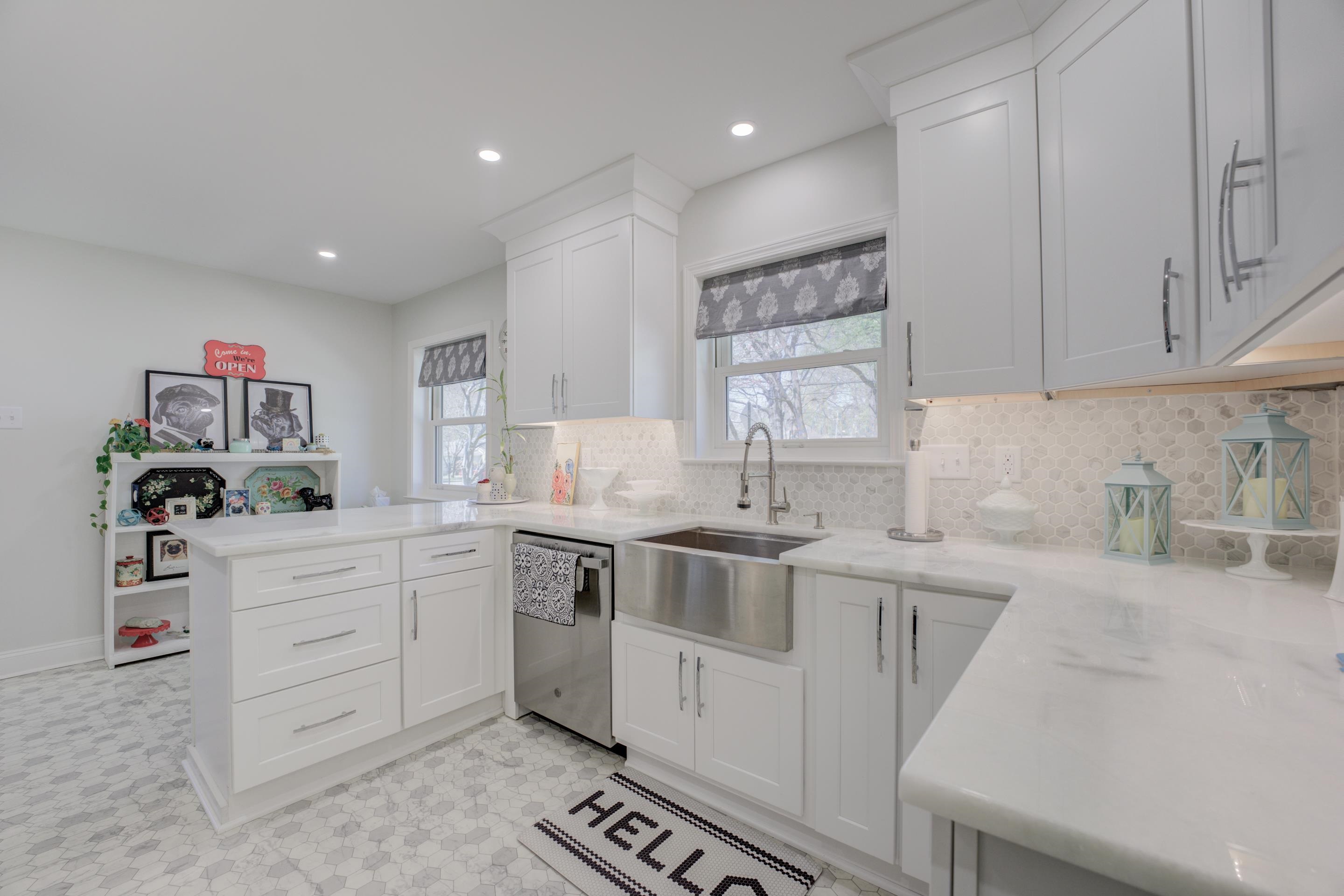 140 North Perkins Road Memphis, TN 38117 - Photo 11 of 25 a kitchen with white cabinets and sink