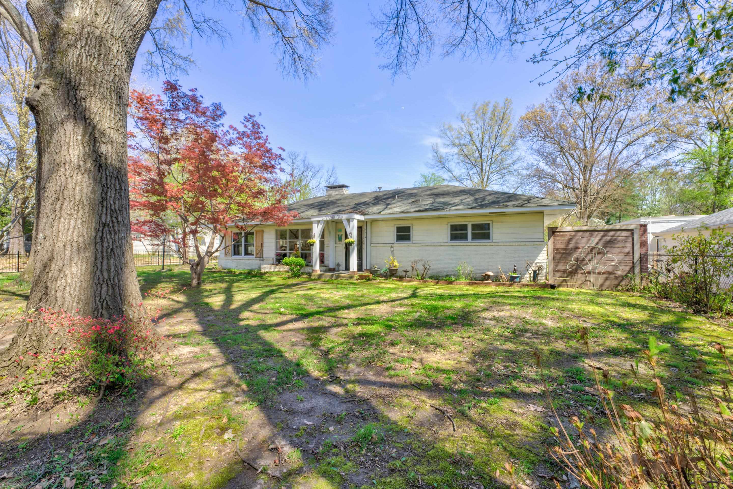 140 North Perkins Road Memphis, TN 38117 - Photo 3 of 25 a view of a house with a backyard