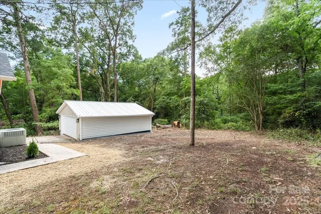 a view of backyard with green space