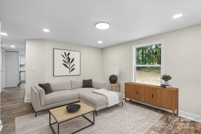 a living room with furniture and window