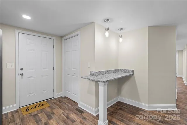 a view of room with hardwood floor