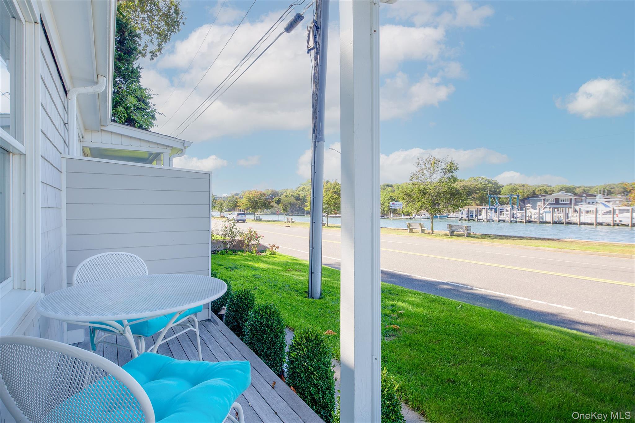 1 Canal Road Hampton Bays, NY 11946 - Photo 44 of 50 View of patio featuring a deck with water view