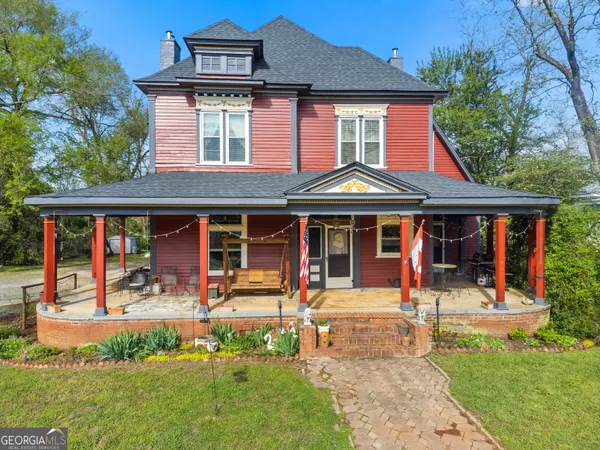 a front view of a house with a porch