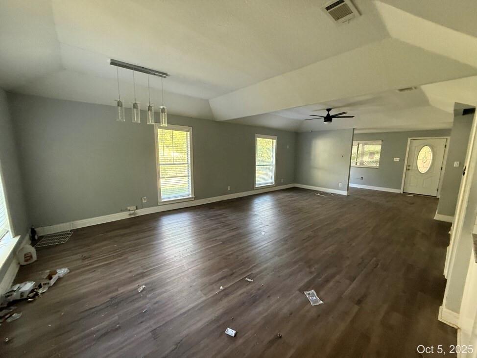 2009 Apache Road Quinlan, TX 75474 - Photo 11 of 19 an empty room with wooden floor and windows