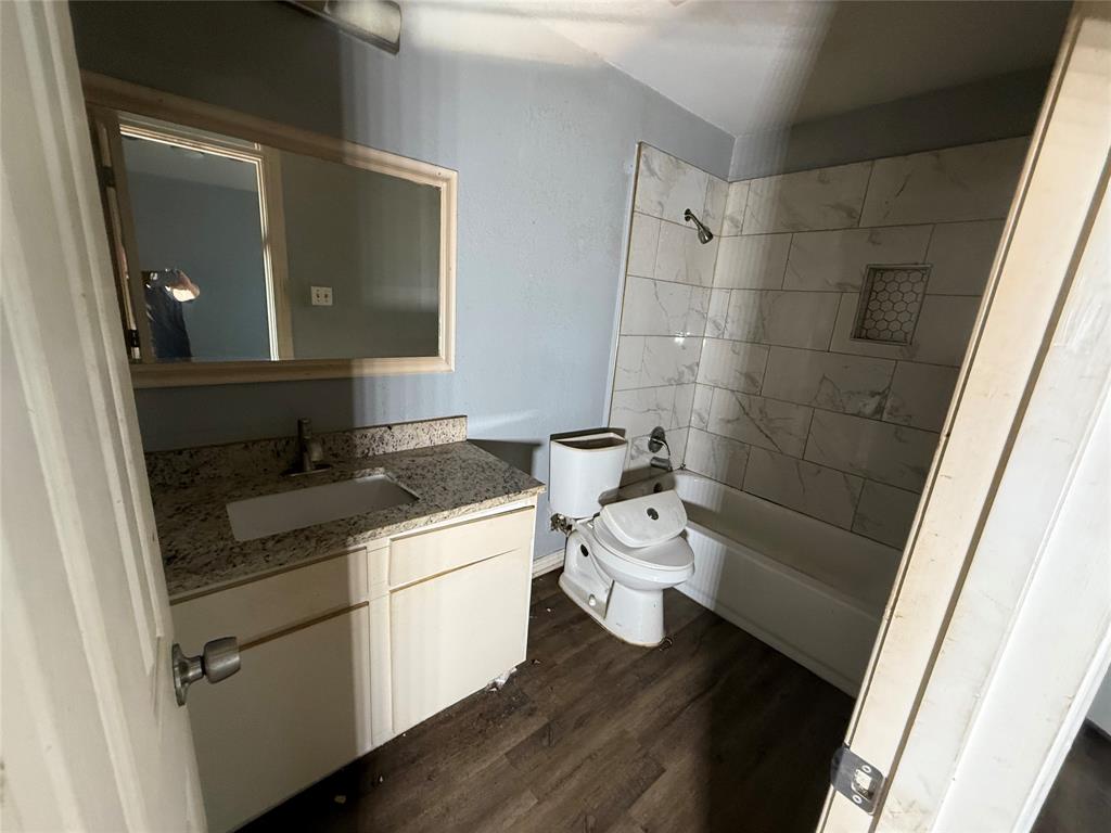 2009 Apache Road Quinlan, TX 75474 - Photo 17 of 19 a bathroom with a sink and a mirror