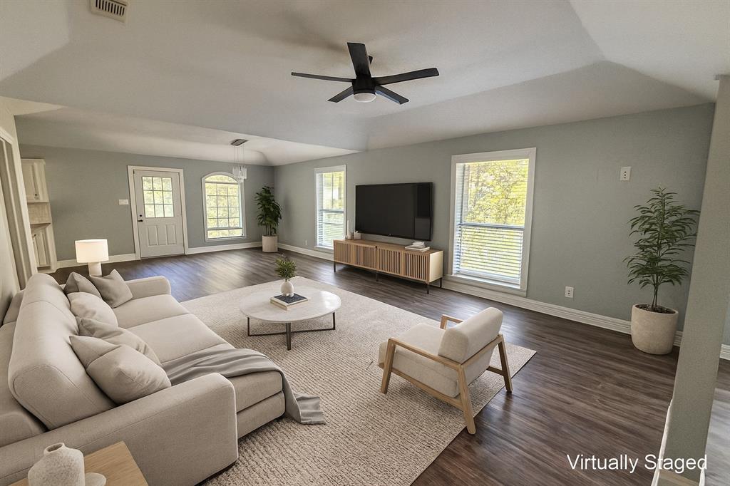 2009 Apache Road Quinlan, TX 75474 - Photo 6 of 19 a living room with furniture a window and a flat screen tv
