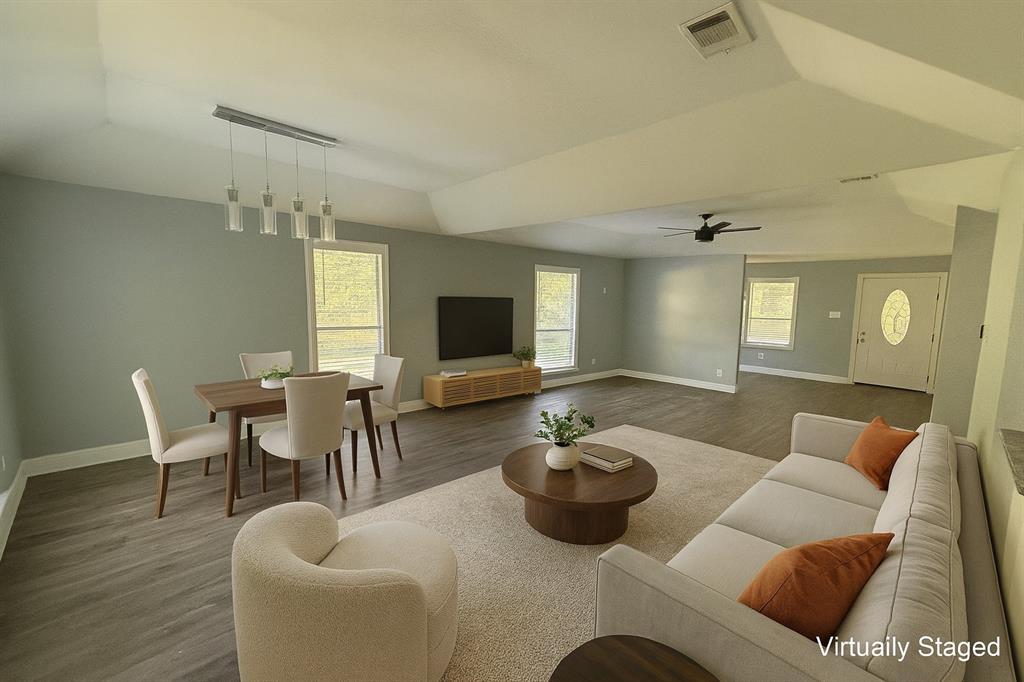 2009 Apache Road Quinlan, TX 75474 - Photo 8 of 19 a living room with furniture kitchen view and a flat screen tv