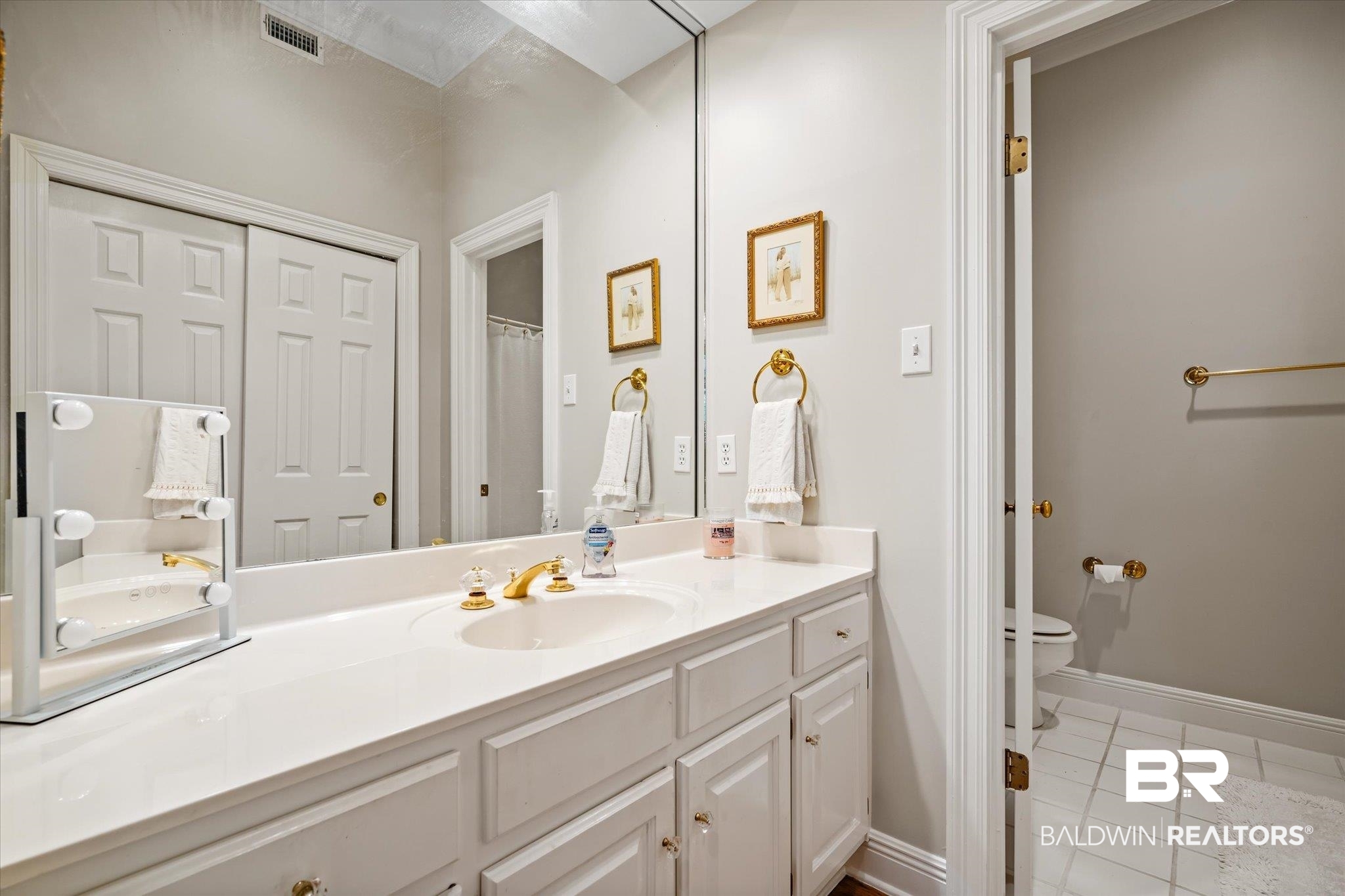 4930 River Trace Theodore, AL 36582 - Photo 18 of 57 Bathroom featuring vanity, toilet, and tile patterned floors