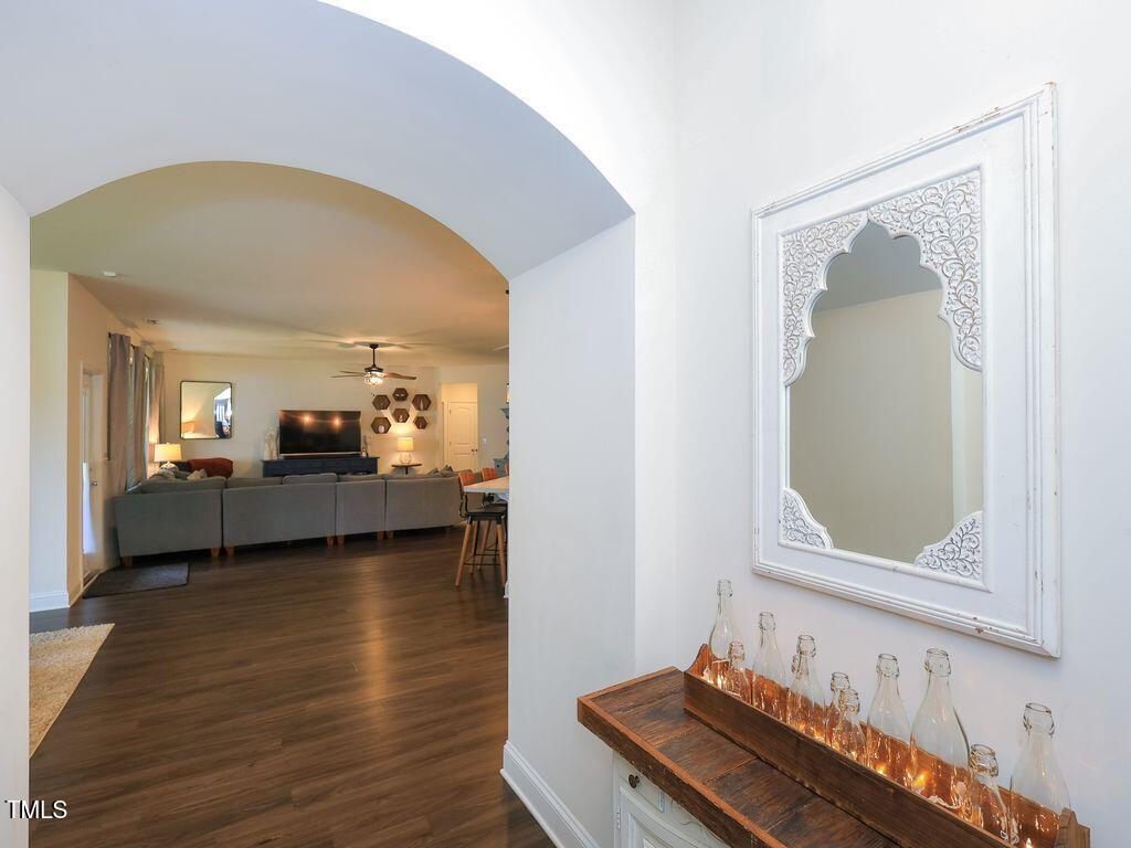 110 Point View Way Franklinton, NC 27525 - Photo 16 of 62 a living room with furniture and a mirror