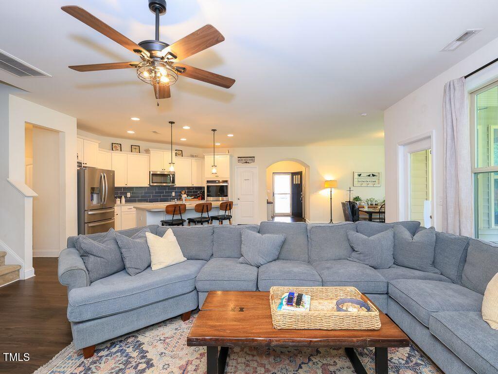 110 Point View Way Franklinton, NC 27525 - Photo 17 of 62 a living room with furniture and a large window