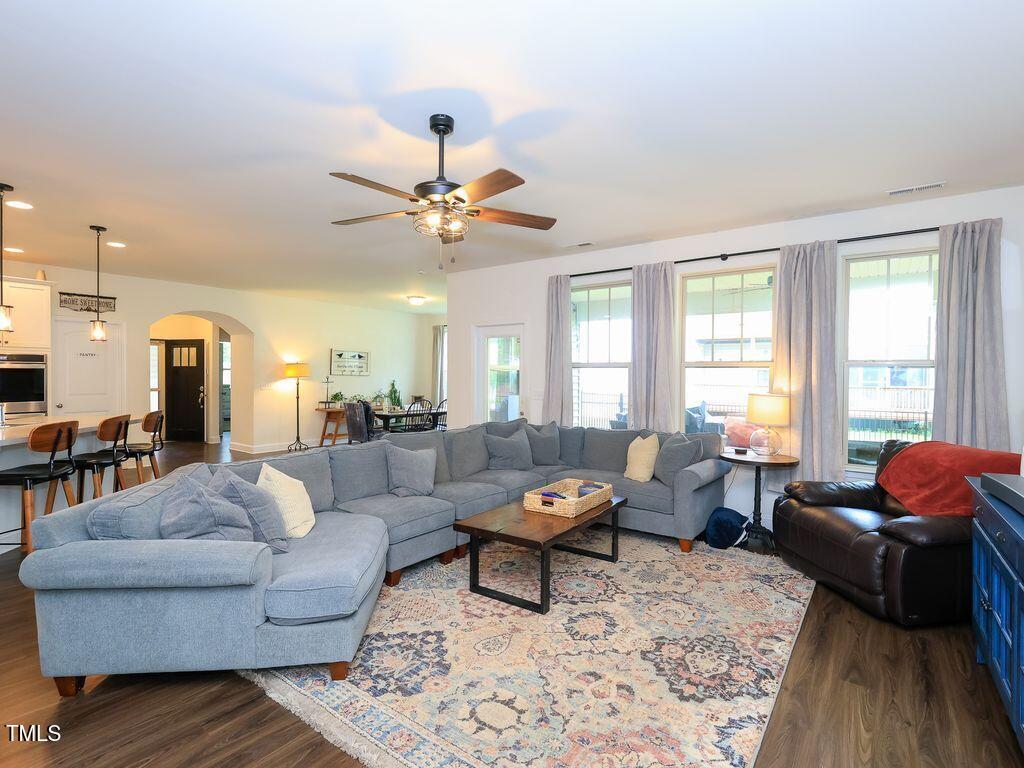 110 Point View Way Franklinton, NC 27525 - Photo 18 of 62 a living room with furniture and a large window