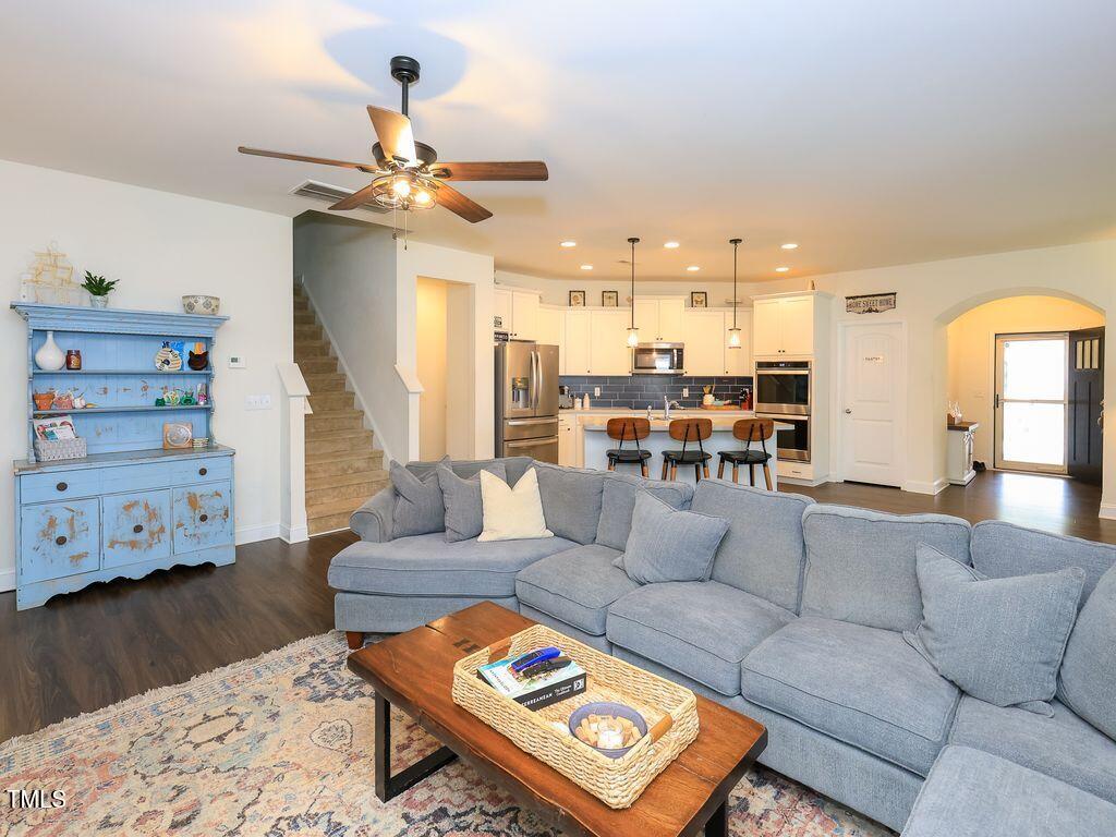 110 Point View Way Franklinton, NC 27525 - Photo 24 of 62 a living room with furniture and wooden floor