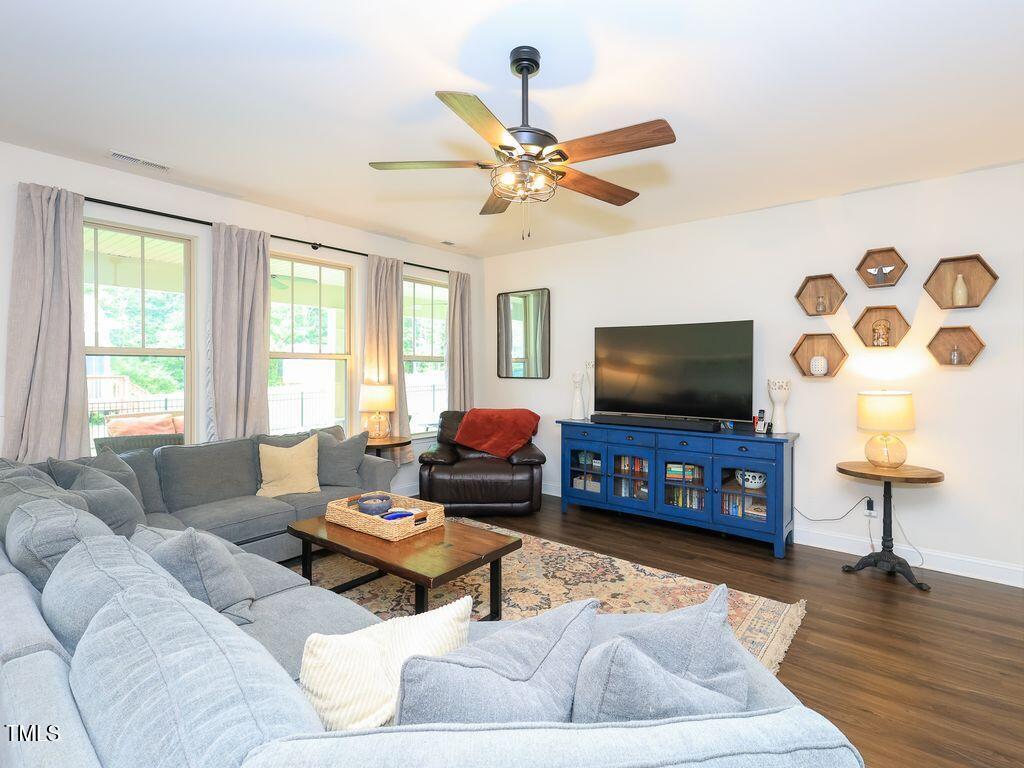 110 Point View Way Franklinton, NC 27525 - Photo 25 of 62 a living room with furniture and a flat screen tv