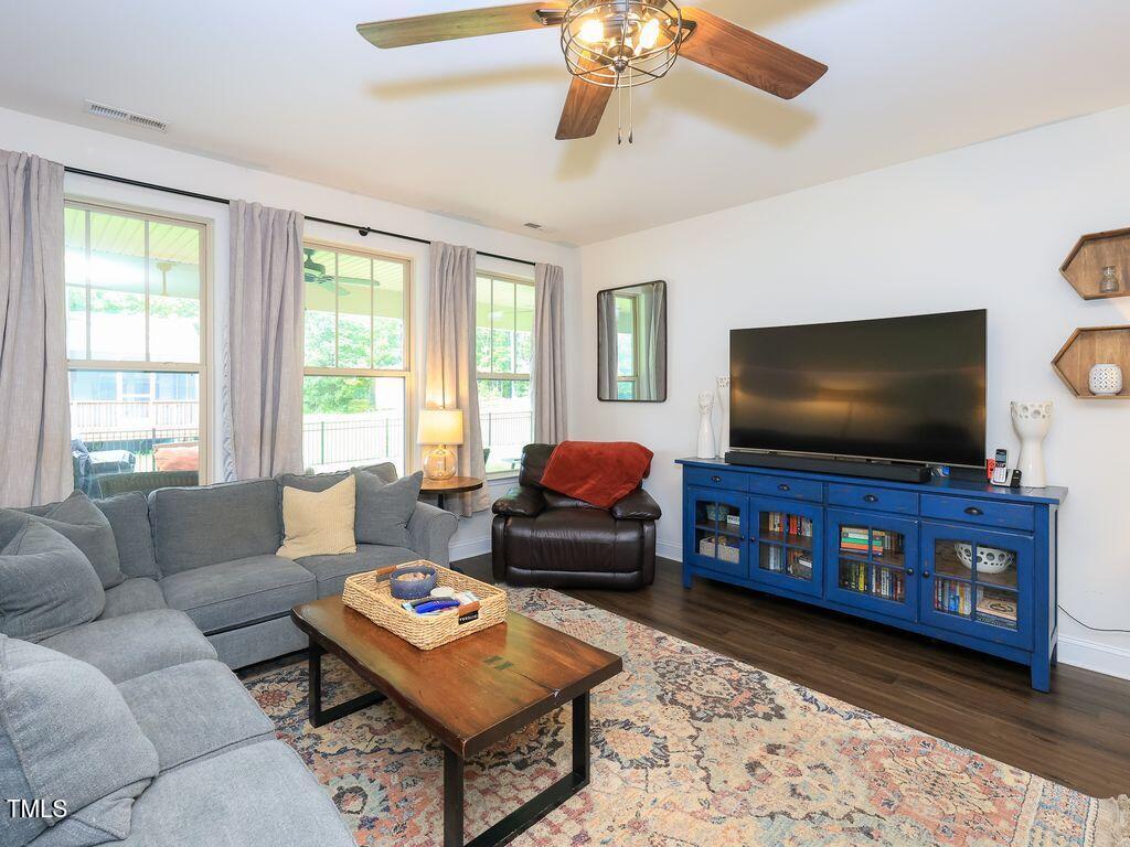 110 Point View Way Franklinton, NC 27525 - Photo 26 of 62 a living room with furniture and a flat screen tv