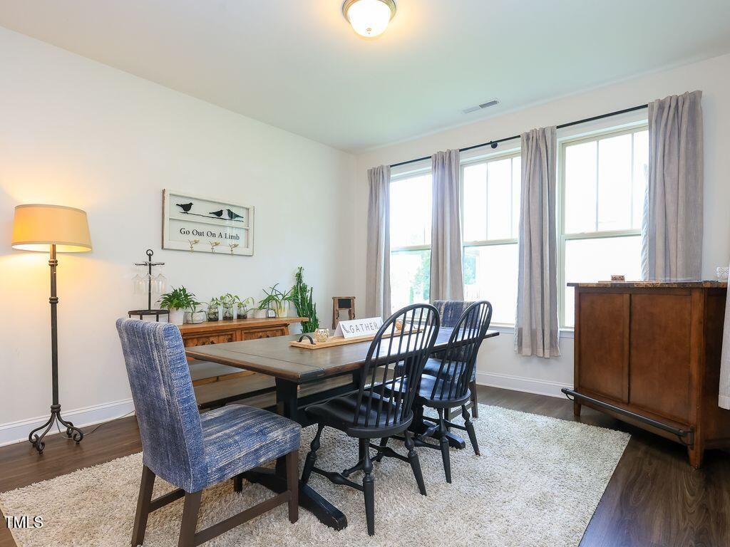 110 Point View Way Franklinton, NC 27525 - Photo 28 of 62 a view of a dining room with furniture and wooden floor