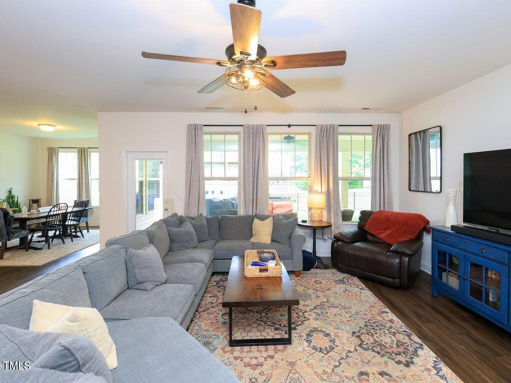 110 Point View Way Franklinton, NC 27525 - Photo 30 of 62 a living room with furniture and a flat screen tv