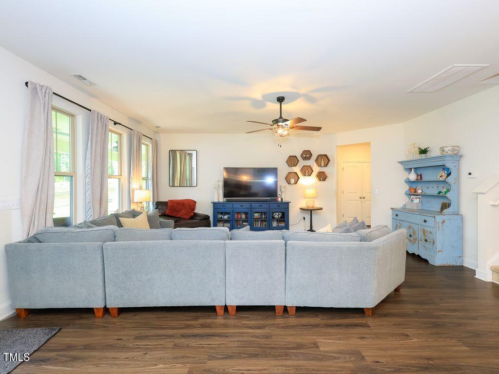 110 Point View Way Franklinton, NC 27525 - Photo 31 of 62 a living room with furniture and a flat screen tv