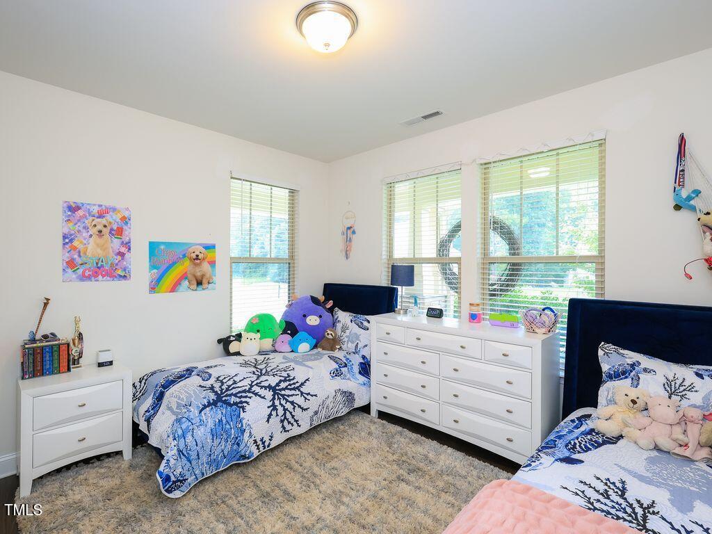 110 Point View Way Franklinton, NC 27525 - Photo 39 of 62 a bedroom with a bed and a window