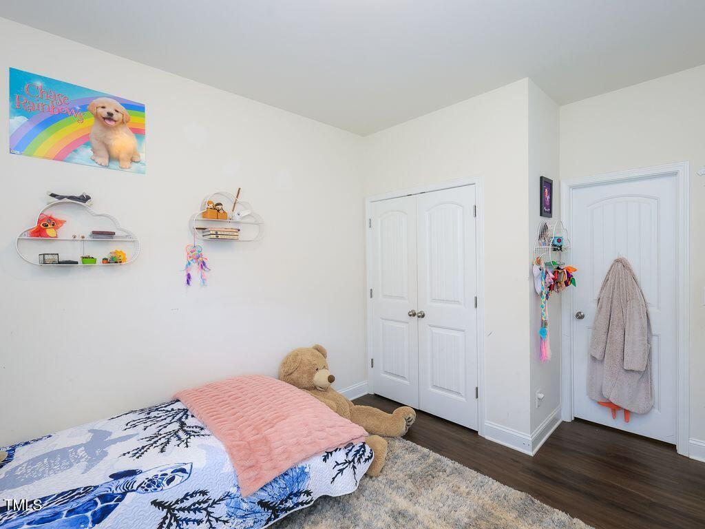 110 Point View Way Franklinton, NC 27525 - Photo 41 of 62 a bedroom with a bed and a window