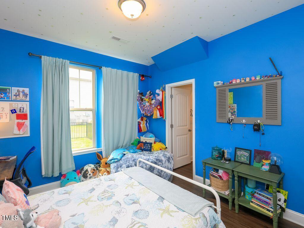 110 Point View Way Franklinton, NC 27525 - Photo 45 of 62 a bedroom with bed and a window