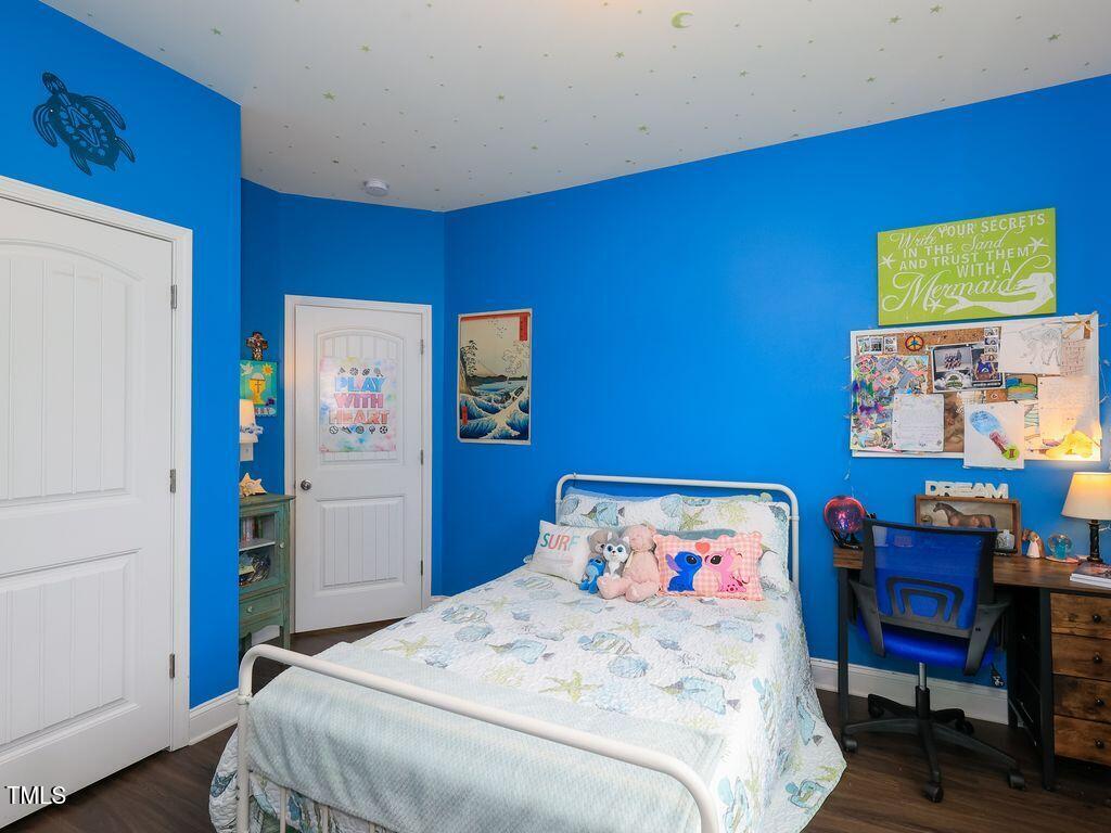 110 Point View Way Franklinton, NC 27525 - Photo 47 of 62 a bedroom with a bed a desk and chair