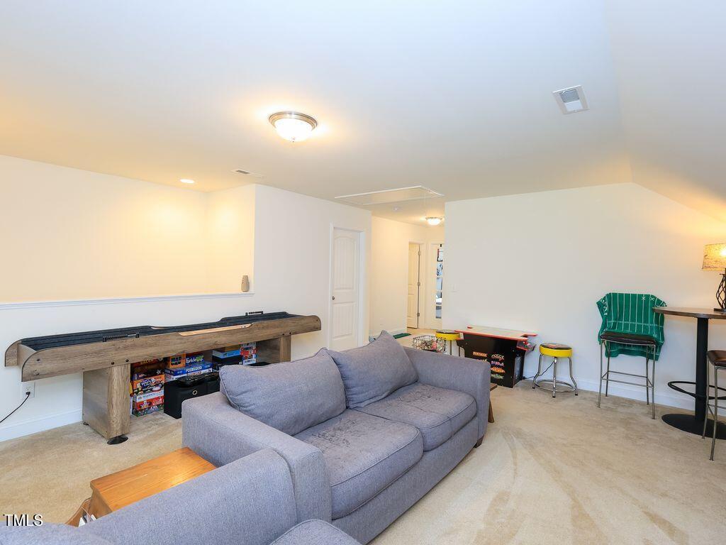 110 Point View Way Franklinton, NC 27525 - Photo 51 of 62 a living room with furniture and a couch