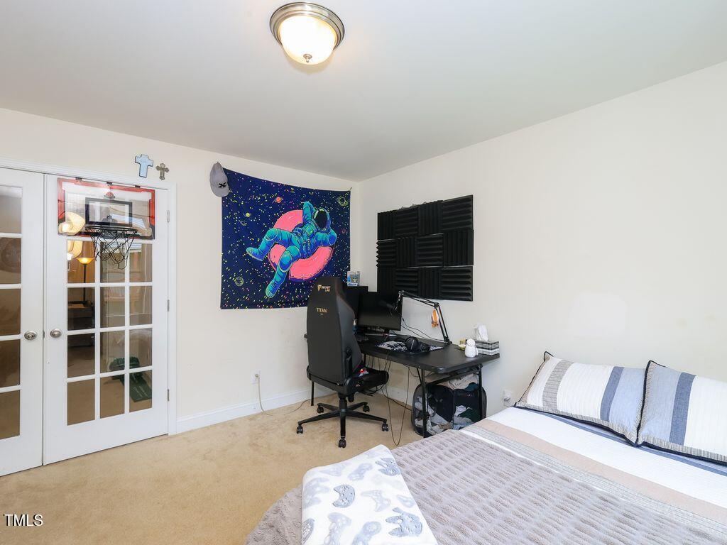 110 Point View Way Franklinton, NC 27525 - Photo 56 of 62 a living room with furniture a rug and a window