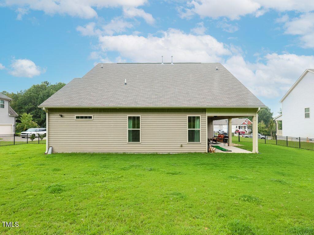 110 Point View Way Franklinton, NC 27525 - Photo 10 of 62 a front view of a house with a garden and yard