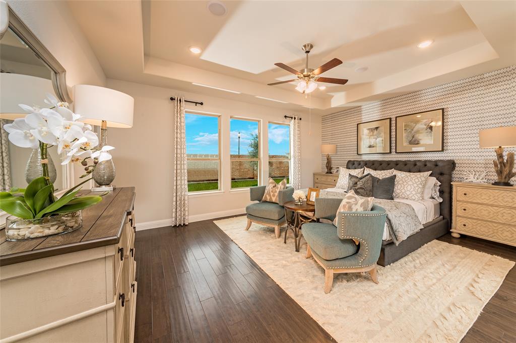 112 Capital Court Forney, TX 75126 - Photo 8 of 13 a living room with furniture and a large window