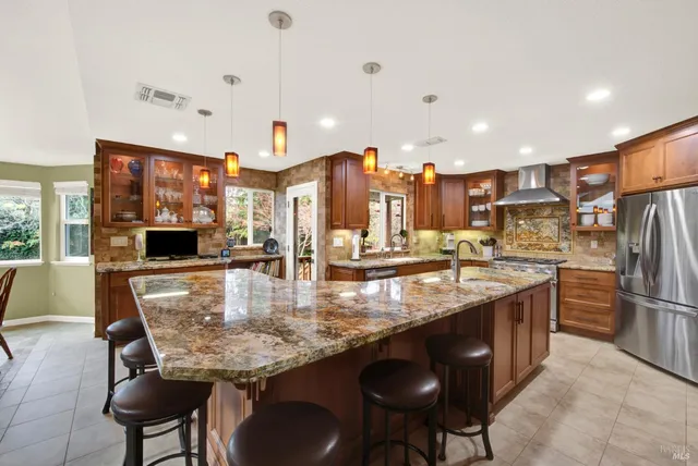 a view of a dining room with furniture window and outside view