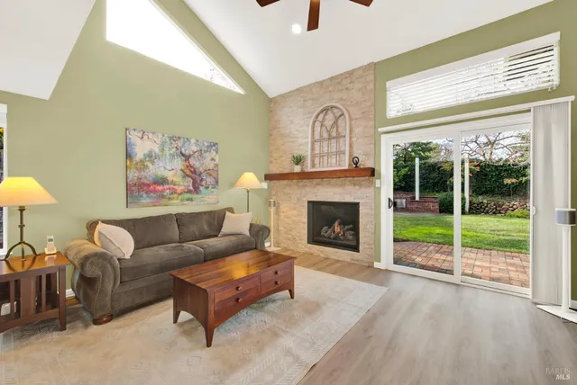 a bathroom with a sink a toilet and a large mirror