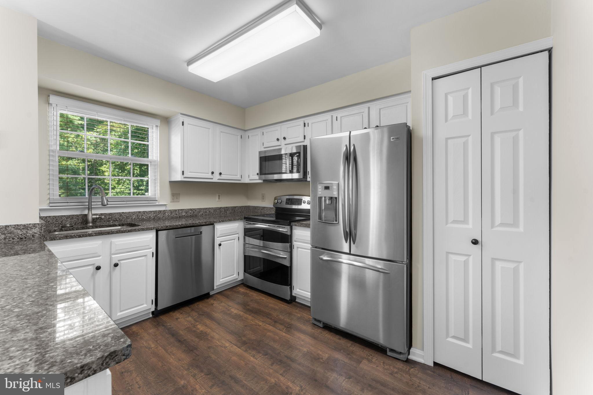 5128 Spring Branch Boulevard Dumfries, VA 22025 - Photo 12 of 60 Stainless appliances and granite countertops.