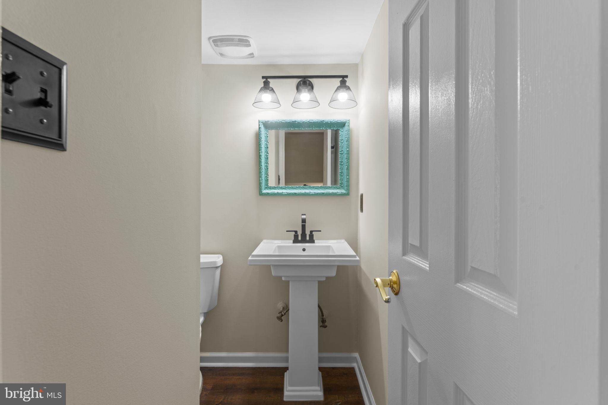 5128 Spring Branch Boulevard Dumfries, VA 22025 - Photo 18 of 60 Half bath on main level.