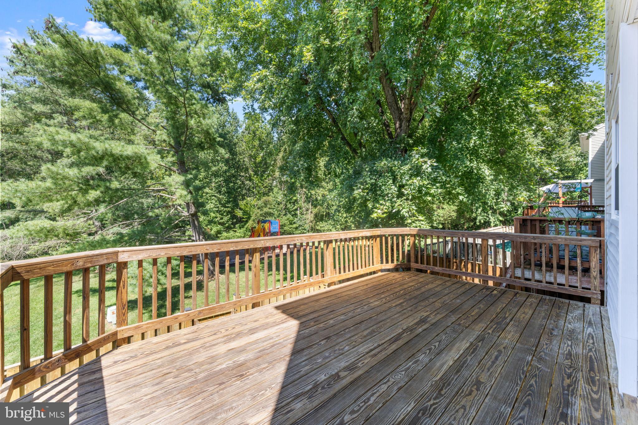 5128 Spring Branch Boulevard Dumfries, VA 22025 - Photo 19 of 60 Expansive and freshly stained deck.