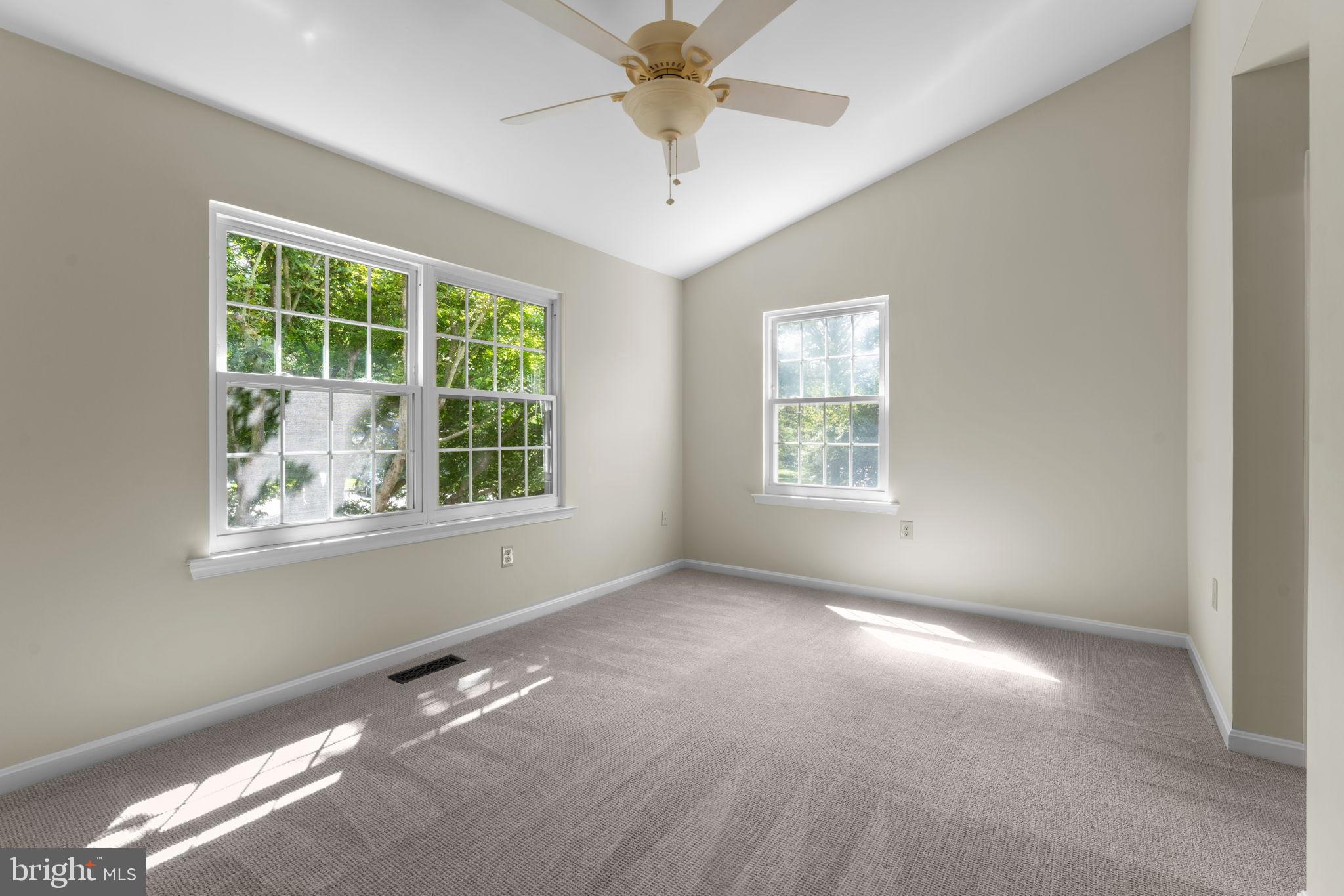 5128 Spring Branch Boulevard Dumfries, VA 22025 - Photo 27 of 60 Primary bedroom w/en-suite and vaulted ceilings.