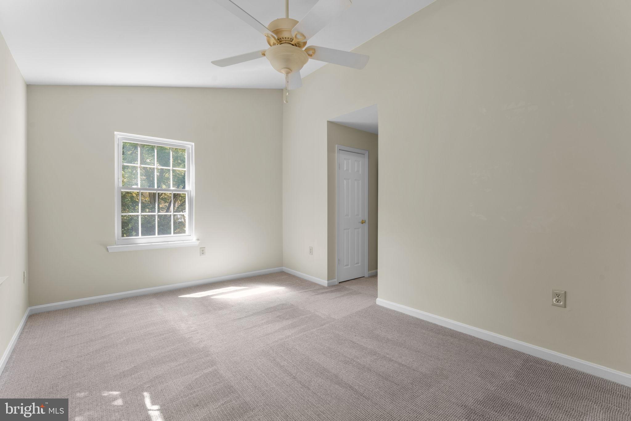 5128 Spring Branch Boulevard Dumfries, VA 22025 - Photo 28 of 60 Primary bedroom w/en-suite and vaulted ceilings.