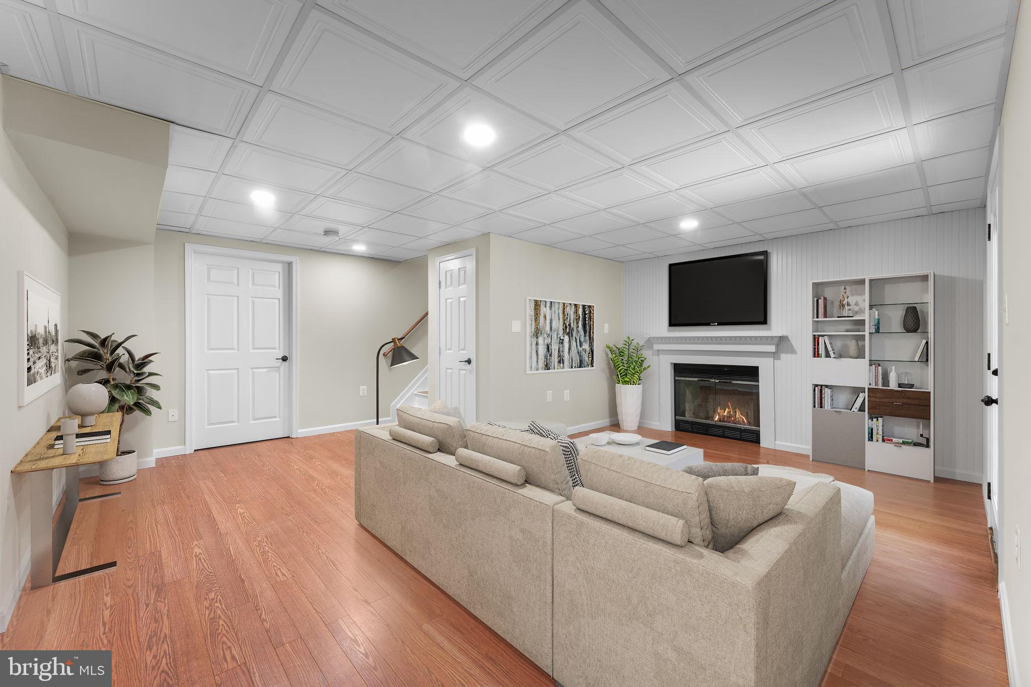 5128 Spring Branch Boulevard Dumfries, VA 22025 - Photo 40 of 60 Fully finished basement (virtually staged).