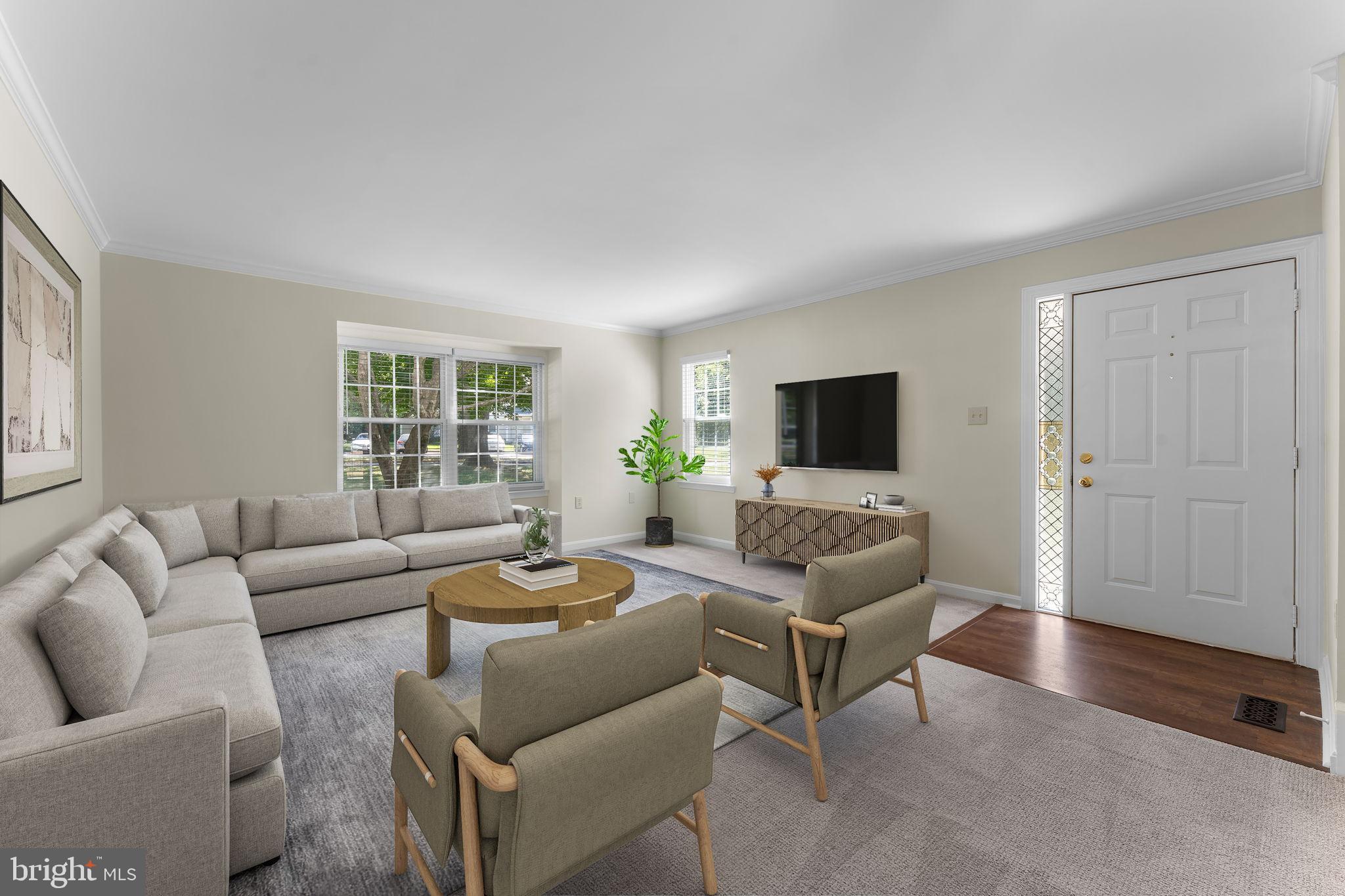 5128 Spring Branch Boulevard Dumfries, VA 22025 - Photo 4 of 60 Large and open living area (virtually staged).