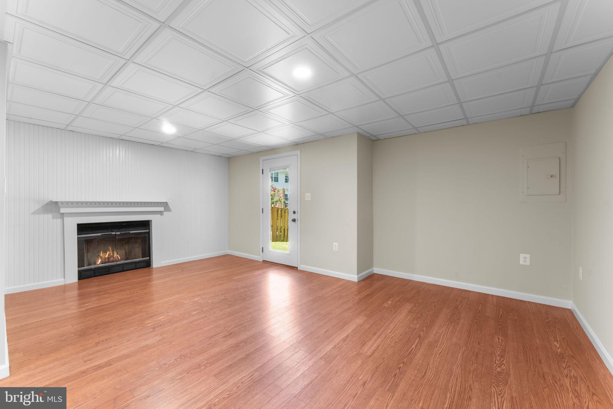 5128 Spring Branch Boulevard Dumfries, VA 22025 - Photo 42 of 60 Luxury vinyl floor and access to back yard.