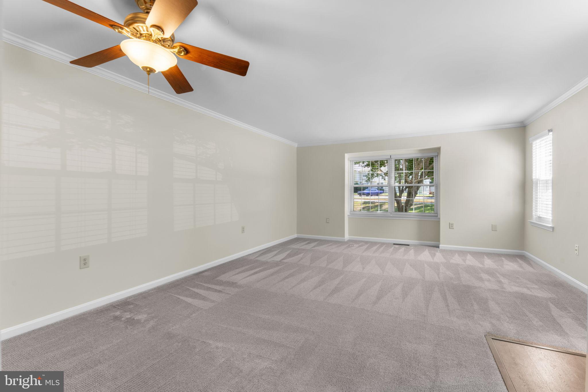 5128 Spring Branch Boulevard Dumfries, VA 22025 - Photo 6 of 60 Living area has tons of light and space.