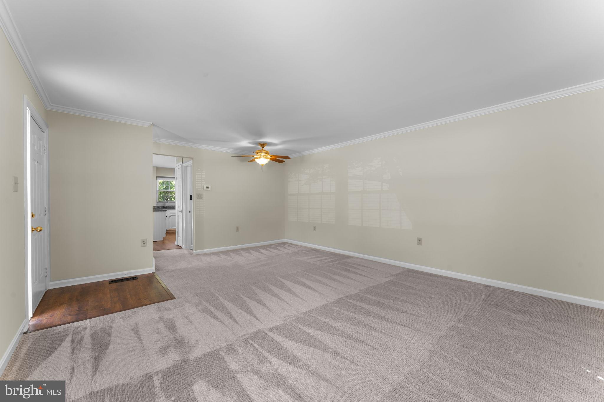 5128 Spring Branch Boulevard Dumfries, VA 22025 - Photo 8 of 60 Living area w/ room for formal dining table!