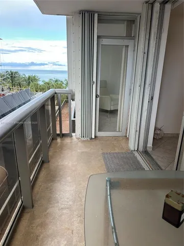 a view of lake with tall building