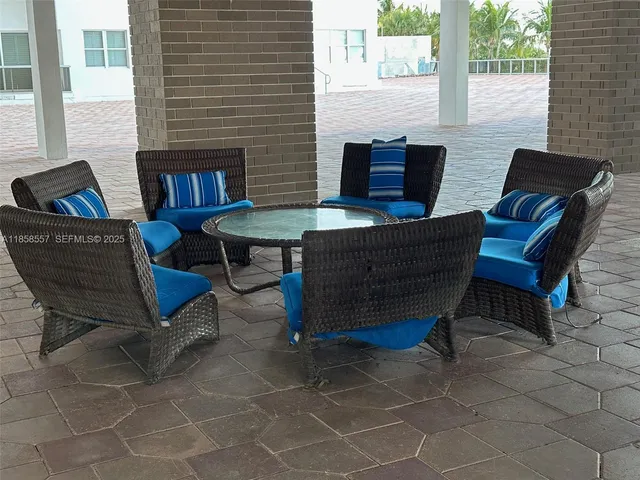 a view of an outdoor space with seating area
