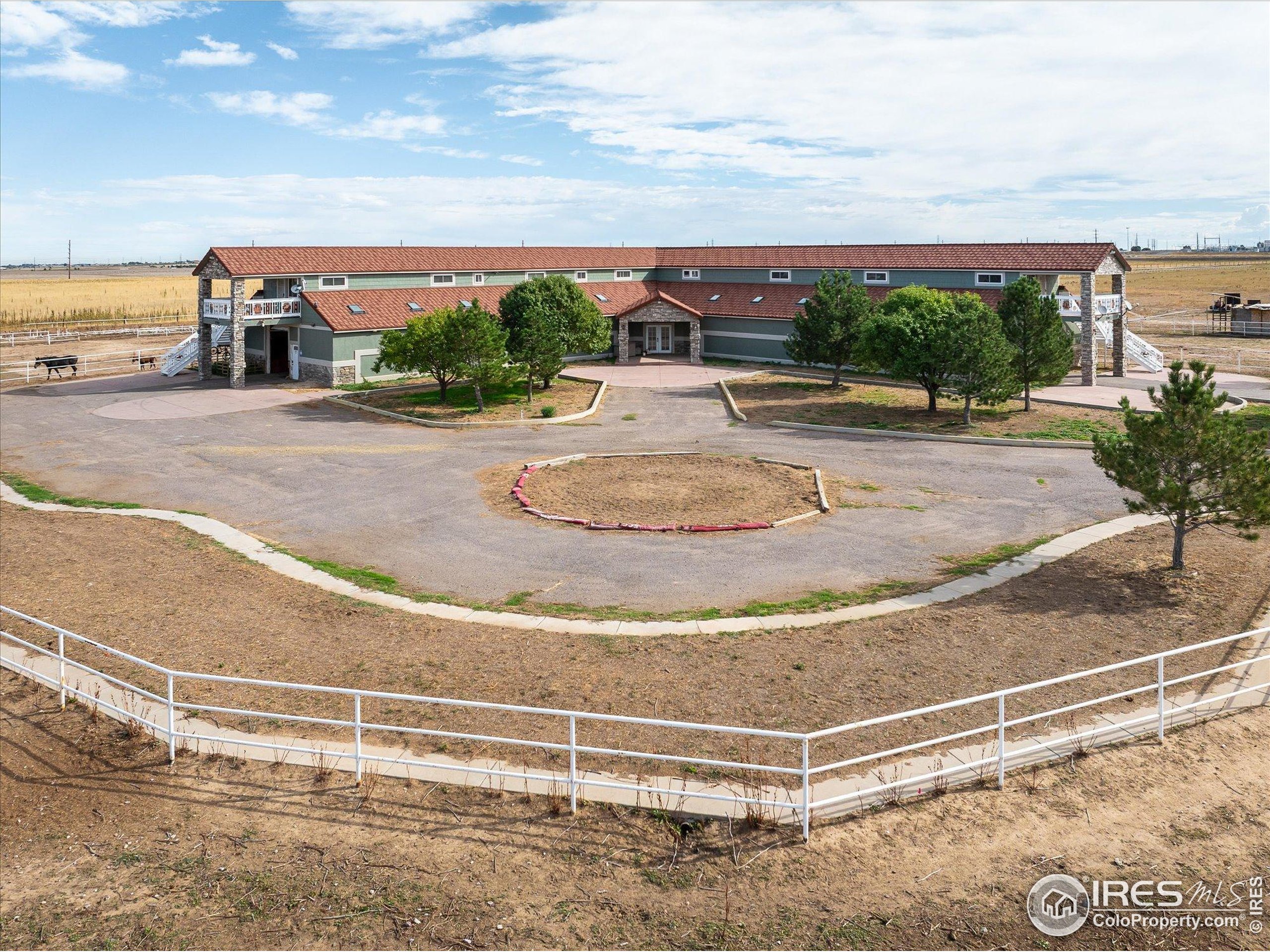 13400 Harvest Road Commerce City, CO 80022 - Photo 11 of 50 a view of a swimming pool with a terrace