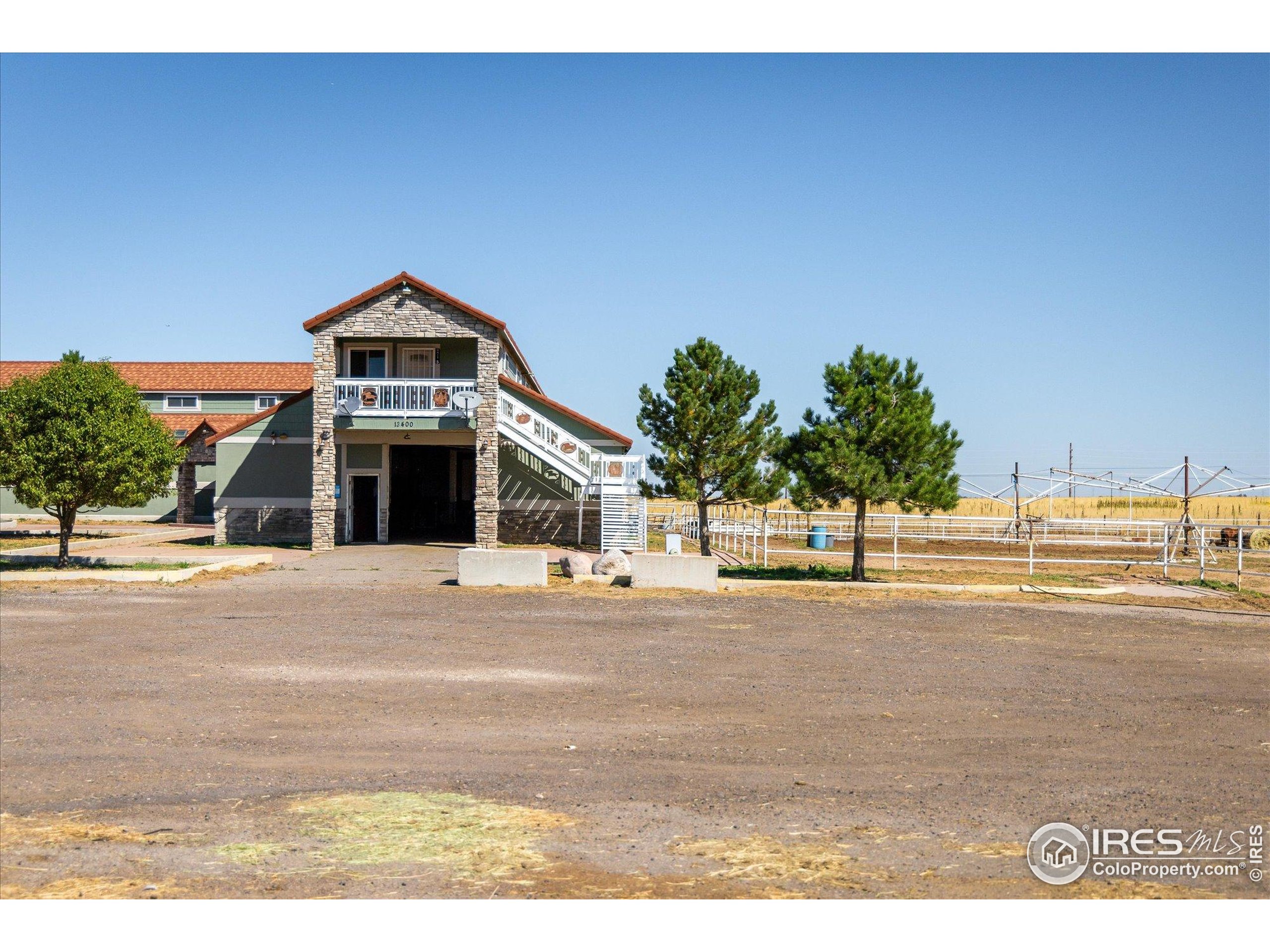 13400 Harvest Road Commerce City, CO 80022 - Photo 14 of 50 a front view of a house with a yard